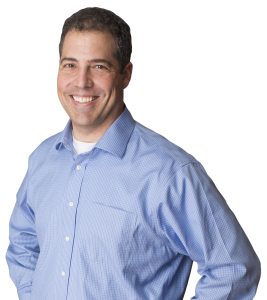 Freeland dentist Dr. Craig Longenecker poses for a photo against a white background
