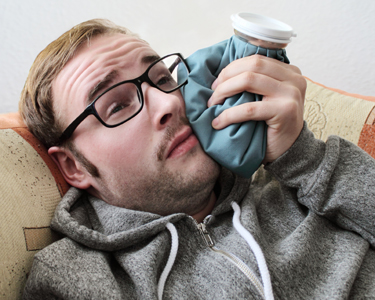 Man experiencing a painful toothache.